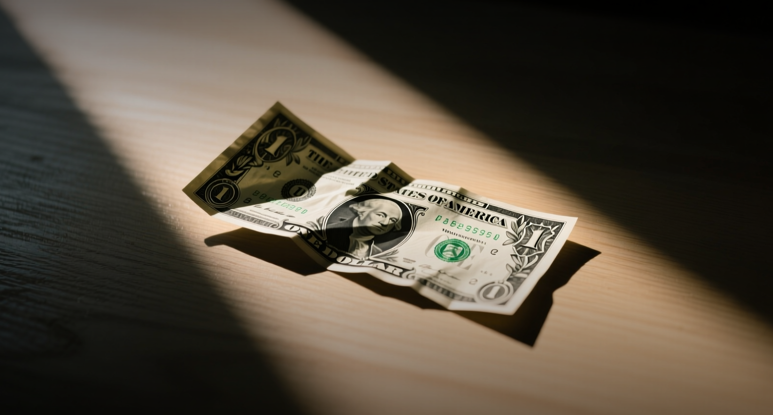 Dollar hits 10-week low as weak data trims Fed hike bets